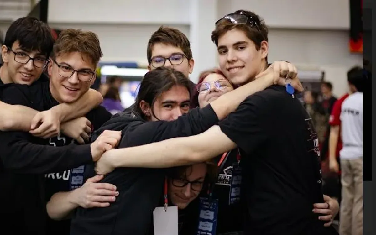 Volta Circuits team celebrating together