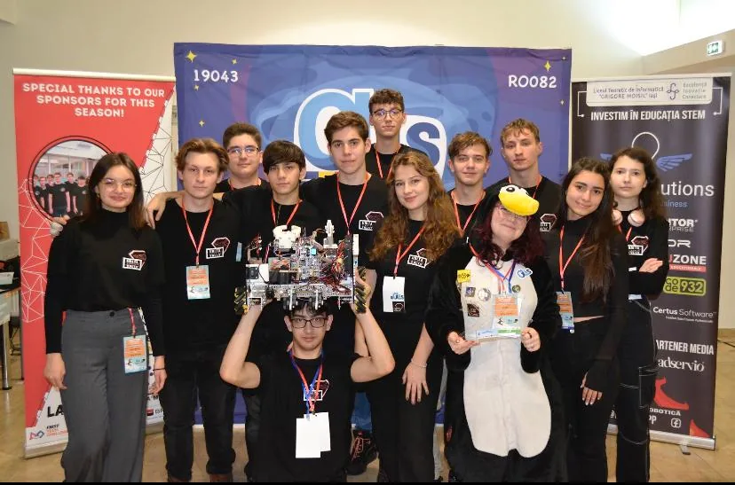 Volta Circuits group portrait with their competition robot