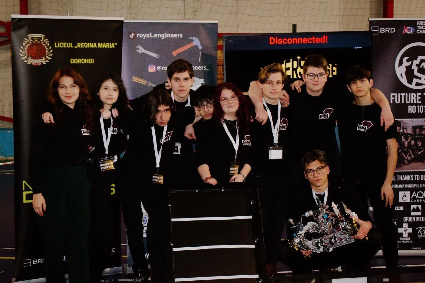 Volta Circuits team portrait with their robot